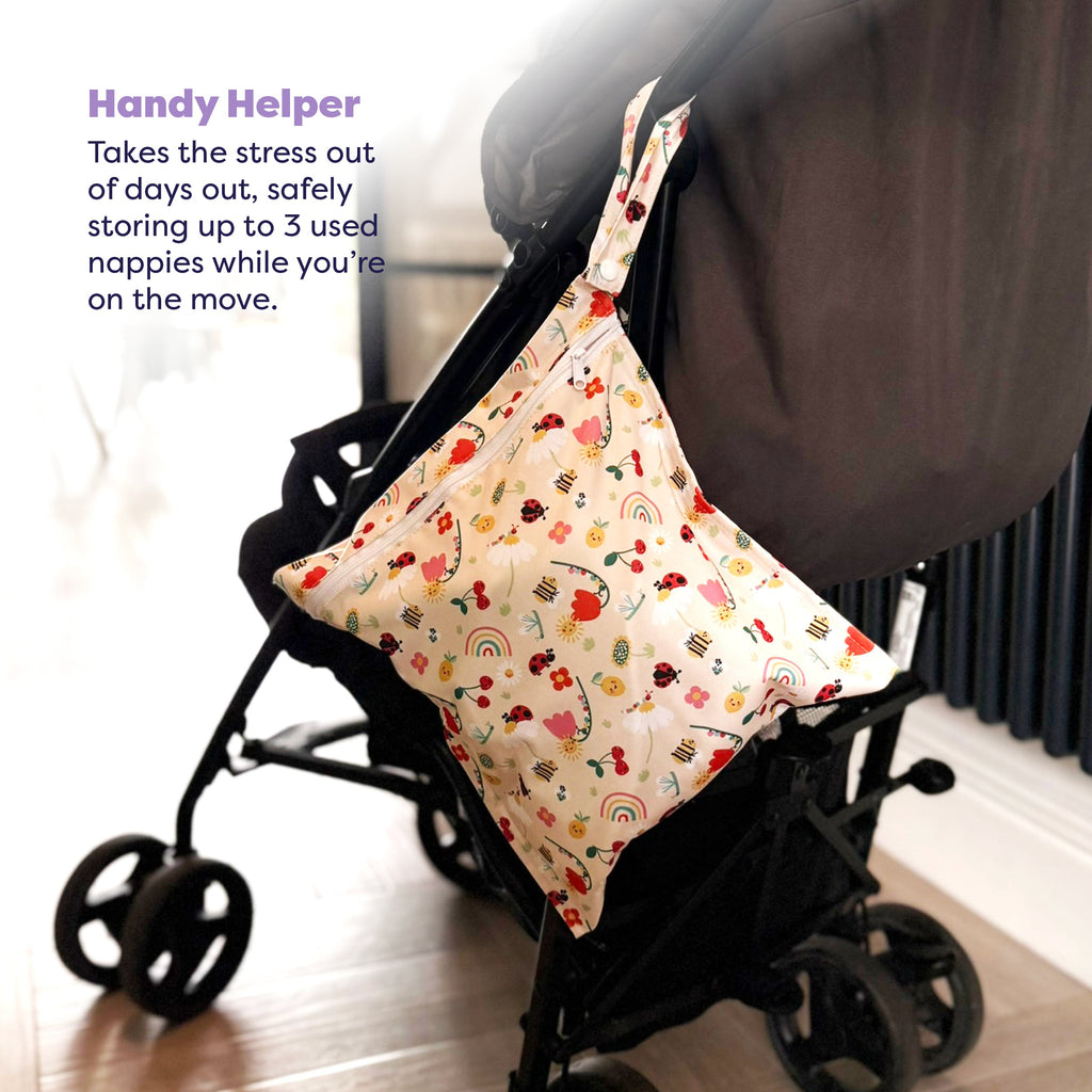 Out and About Waterproof Wet Nappy Bag in Sunshine Friends