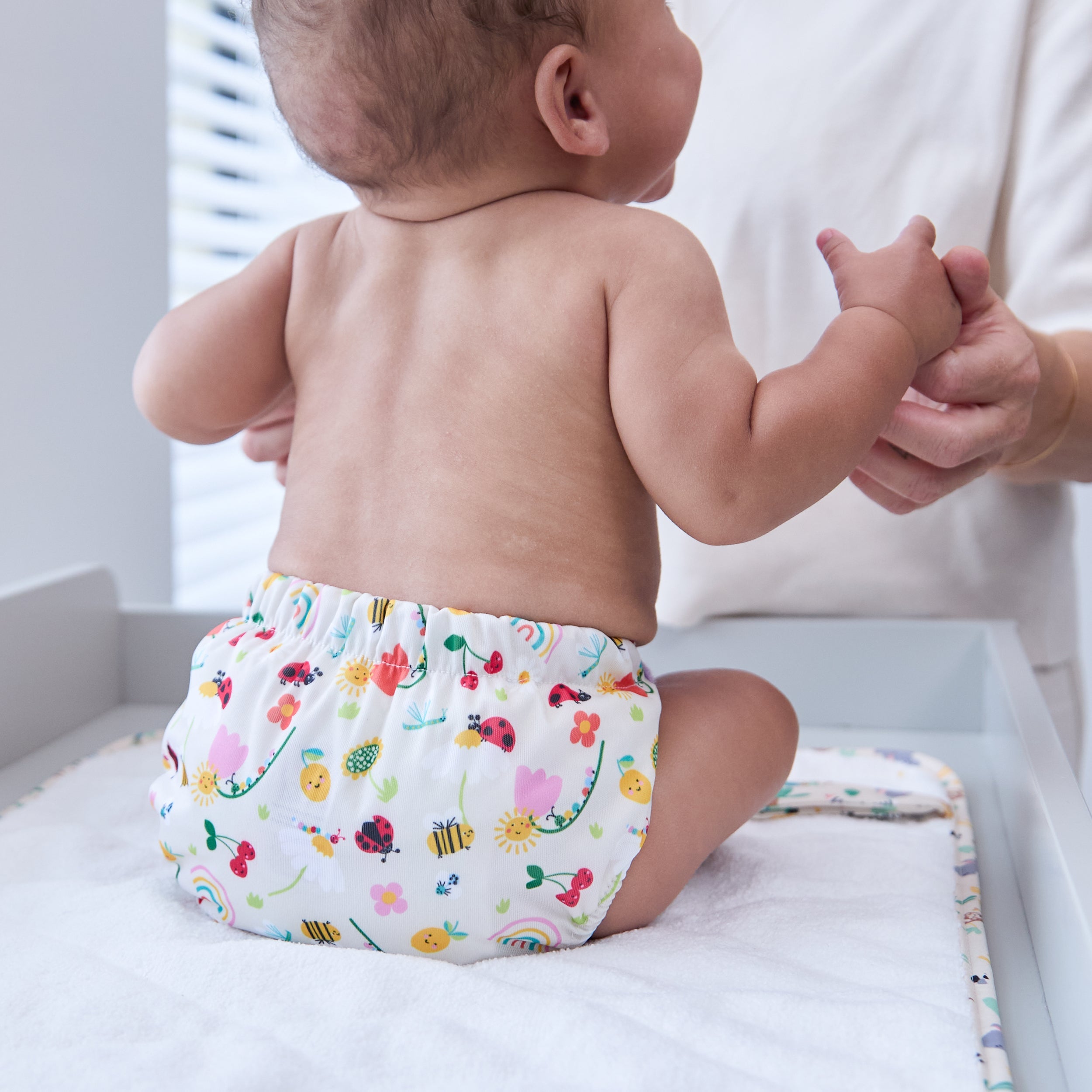 On-The-Move Baby Changing Mat in Sunshine Friends